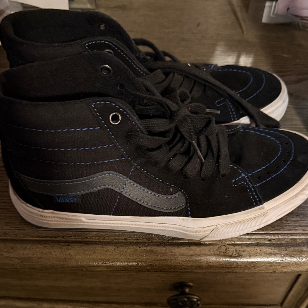Vans High Top Sneakers in Black with Blue Stitching